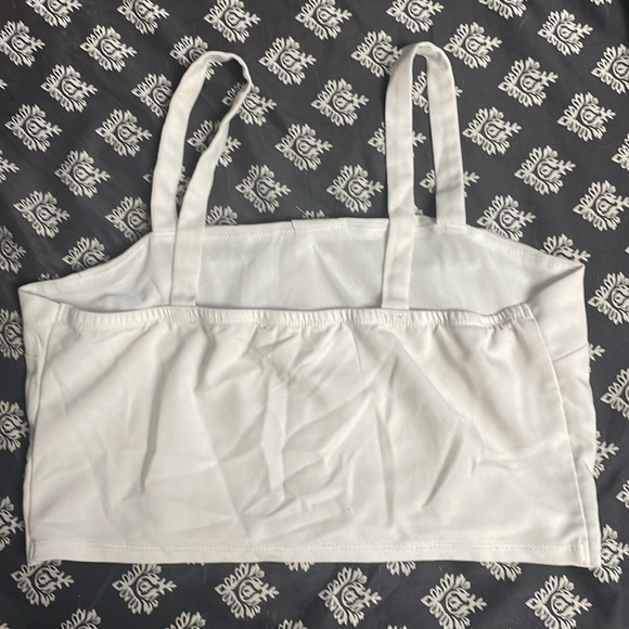 Medium size shirt I have only wore once at the beach. - Picture 2 of 3